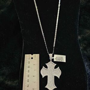 14CTW Moissanite Cross Pendant on 22" chain in 925 sterling silver.